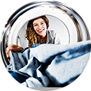 girl looking in dryer